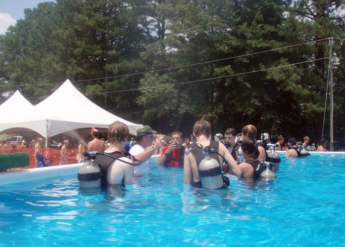 Youth experiencing introductory scuba with NAUI professionals at Summit Bechtel Reserve, 2026 National Scout Jamboree.