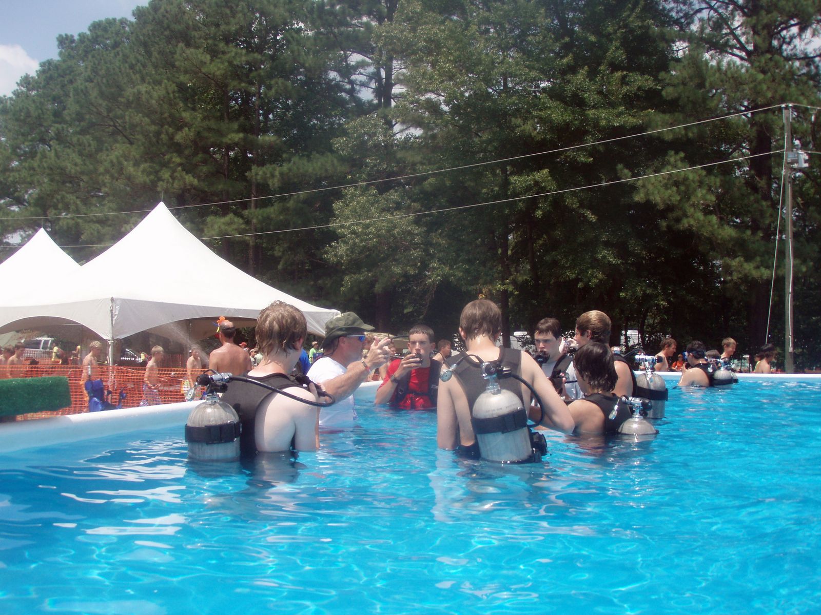 Youth experiencing introductory scuba with NAUI professionals at Summit Bechtel Reserve, 2026 National Scout Jamboree.